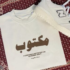 “مكتوب” T-shirt